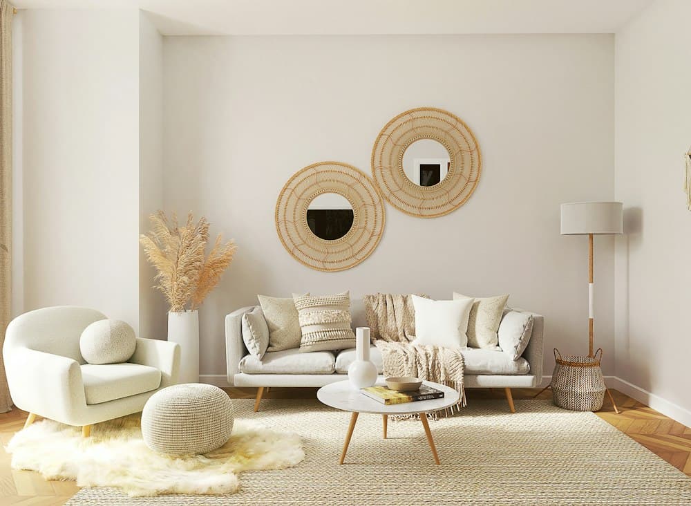 A bright, tidy living room with a cream sofa and natural wood furnishings